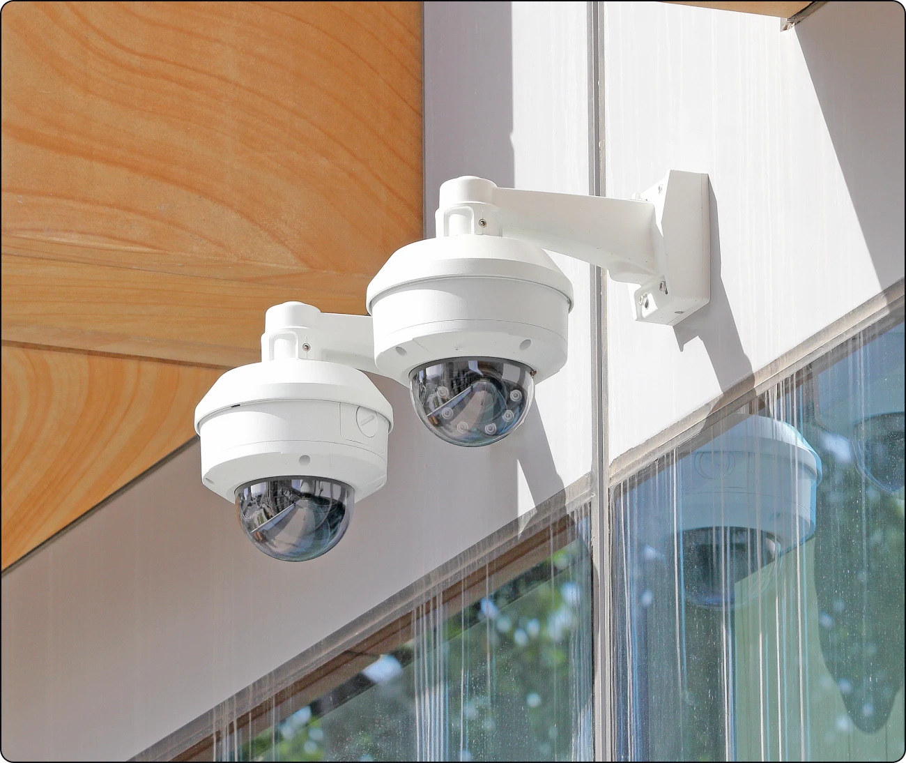 Security cameras mounted on building exterior