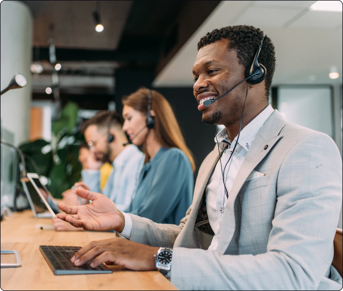 Professionals providing customer support in office