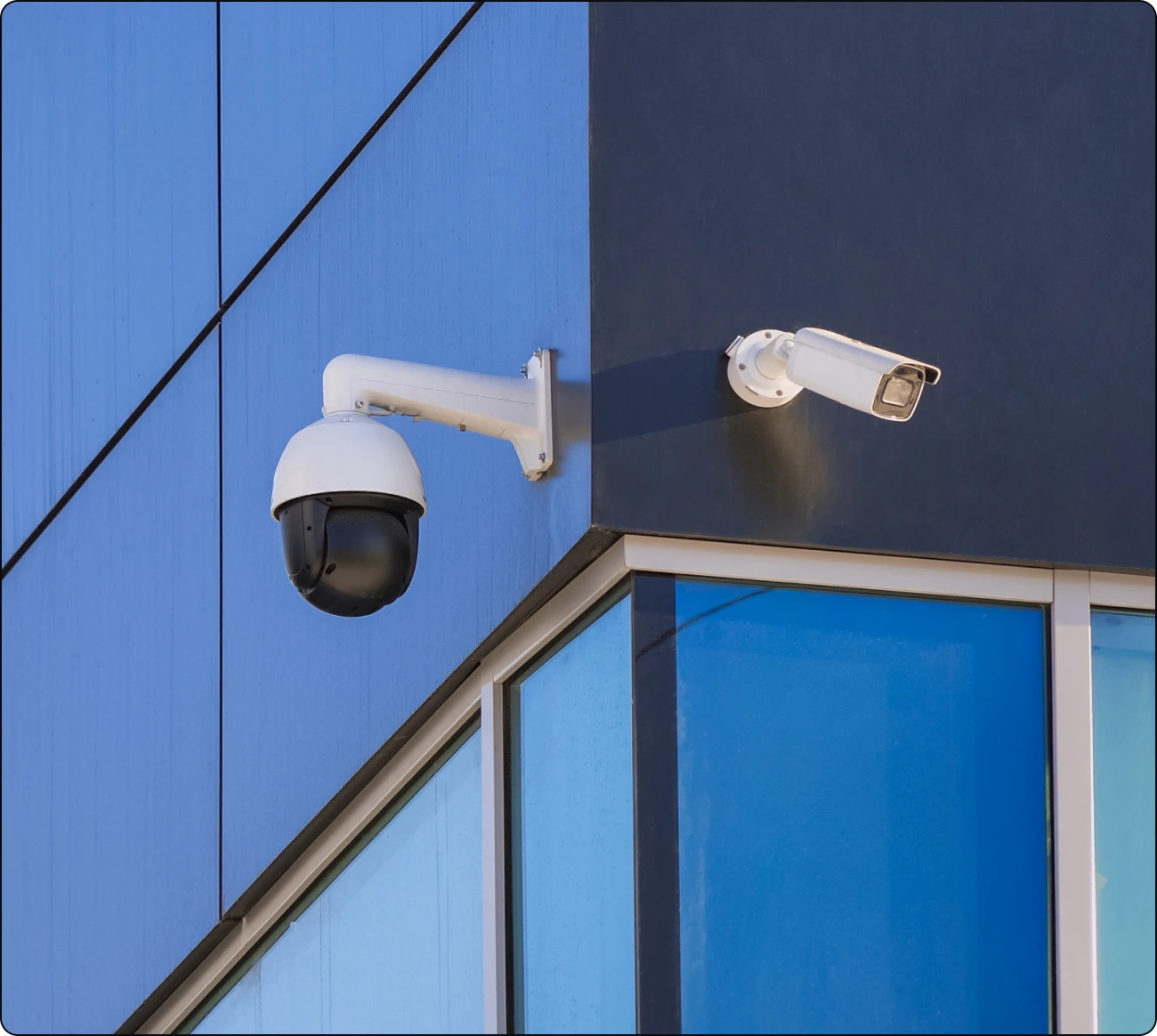 Security cameras on building corner